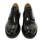 Stringata in pelle nera lucida